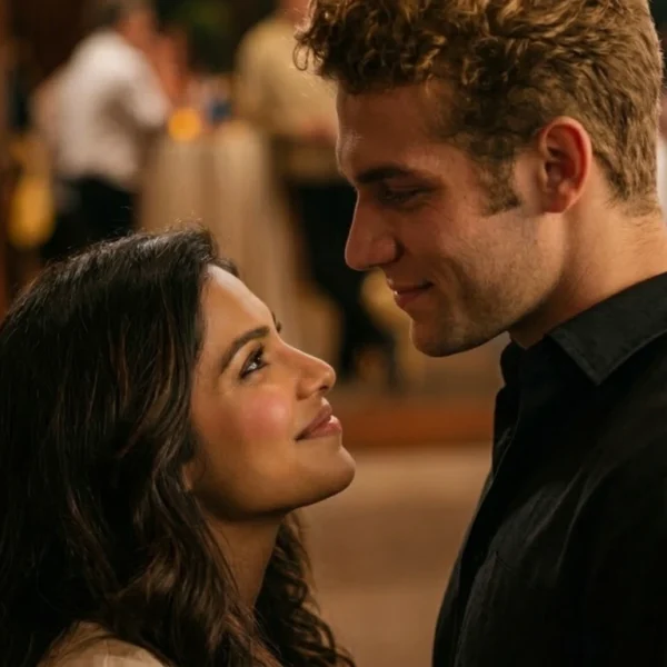 Relationship | Young Sri Lankan couple sitting together in a softly lit living room, with the woman looking thoughtful while holding a mug and the man gently looking at her with concern, creating an intimate and emotional moment.