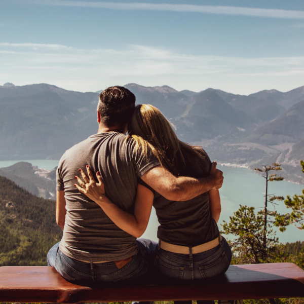 Describes five ways people receive and express love in a relationship. These are kind words, quality time, physical touch, helping, caring, and receiving gifts.