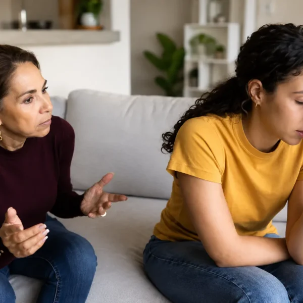 Generation | Mother and daughter having a tense conversation at home.