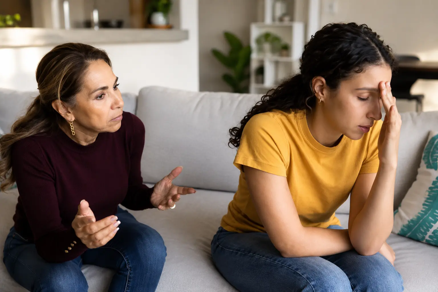 Generation | Mother and daughter having a tense conversation at home.